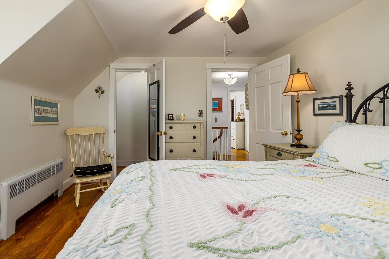 2 Terrace Lane Luray, VA 22835 - Photo 25 of 37 a bedroom with a bed and a chandelier