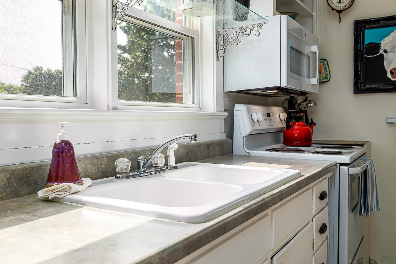 2 Terrace Lane Luray, VA 22835 - Photo 6 of 37 a bathroom with a granite countertop sink and a window