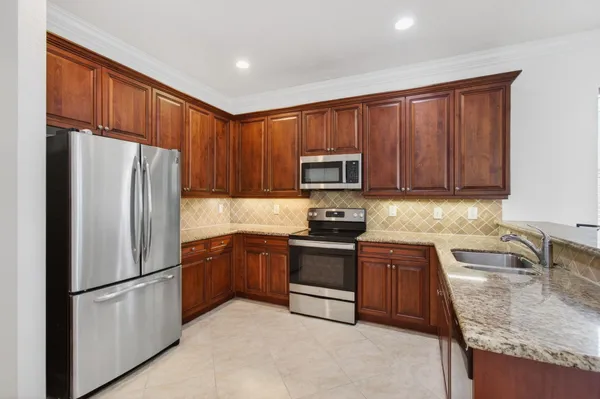 a view of room with hardwood floor and window
