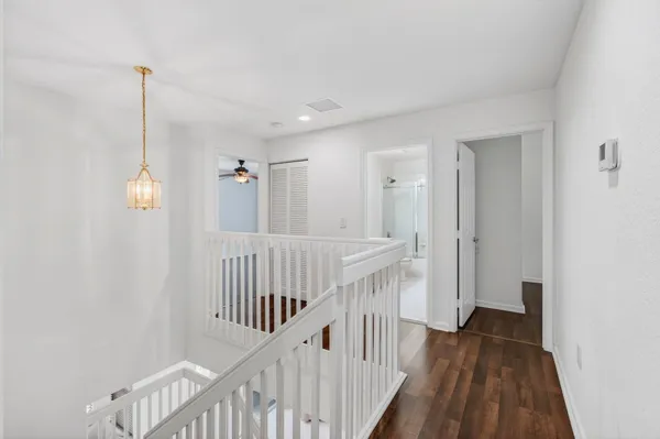 a view of a backyard with sitting area