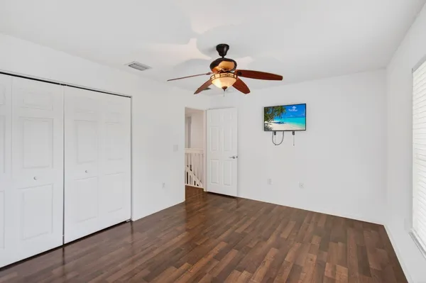 an aerial view of residential house with outdoor space and swimming pool