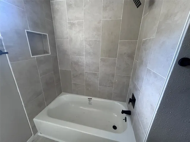 a bathroom with a bathtub