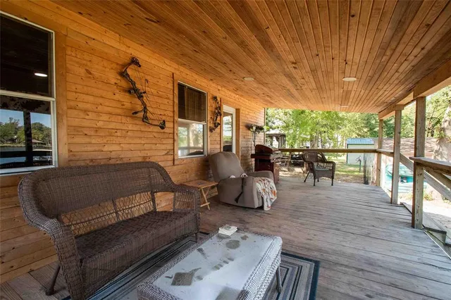 a outdoor living space with furniture and garden view