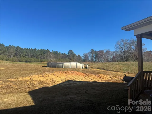 a view of lake with mountain in background