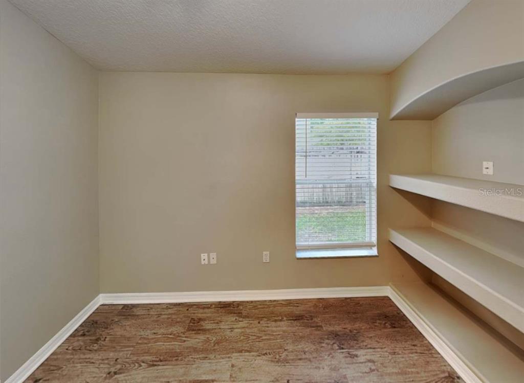 1805 Concord Drive Apopka, FL 32703 - Photo 10 of 12 a view of an empty room and window