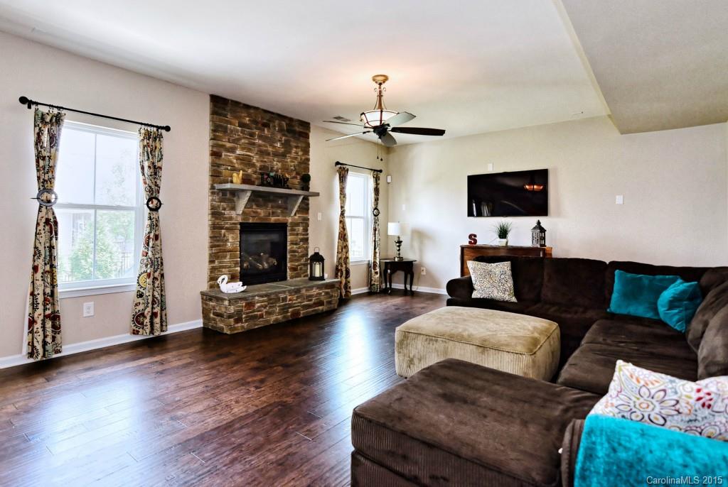 1605 Ridgehaven Road Waxhaw, NC 28173 - Photo 11 of 24 a living room with furniture and a flat screen tv