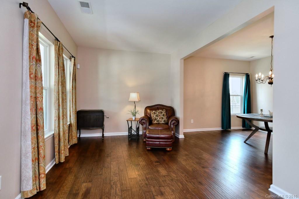 1605 Ridgehaven Road Waxhaw, NC 28173 - Photo 3 of 24 a living room with furniture and a wooden floor