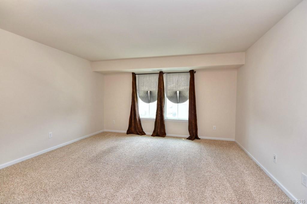 1605 Ridgehaven Road Waxhaw, NC 28173 - Photo 23 of 24 a view of a room with large window