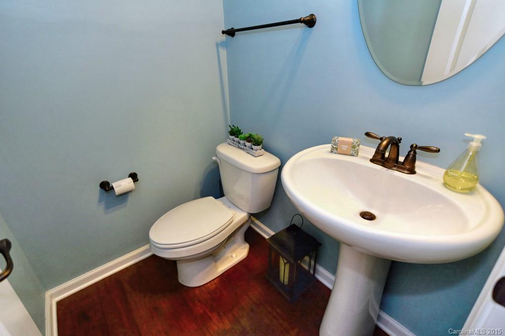 1605 Ridgehaven Road Waxhaw, NC 28173 - Photo 5 of 24 a bathroom with a sink mirror and toilet