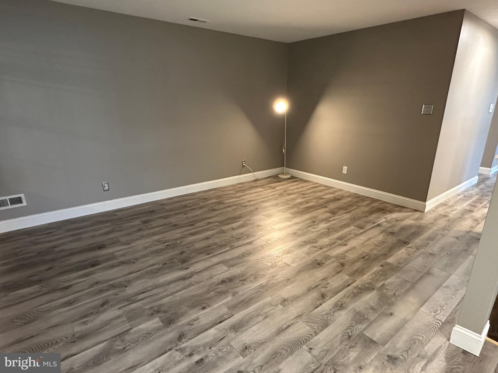 48 Maple Leaf Circle Sewell, NJ 08080 - Photo 11 of 23 a view of empty room with wooden floor