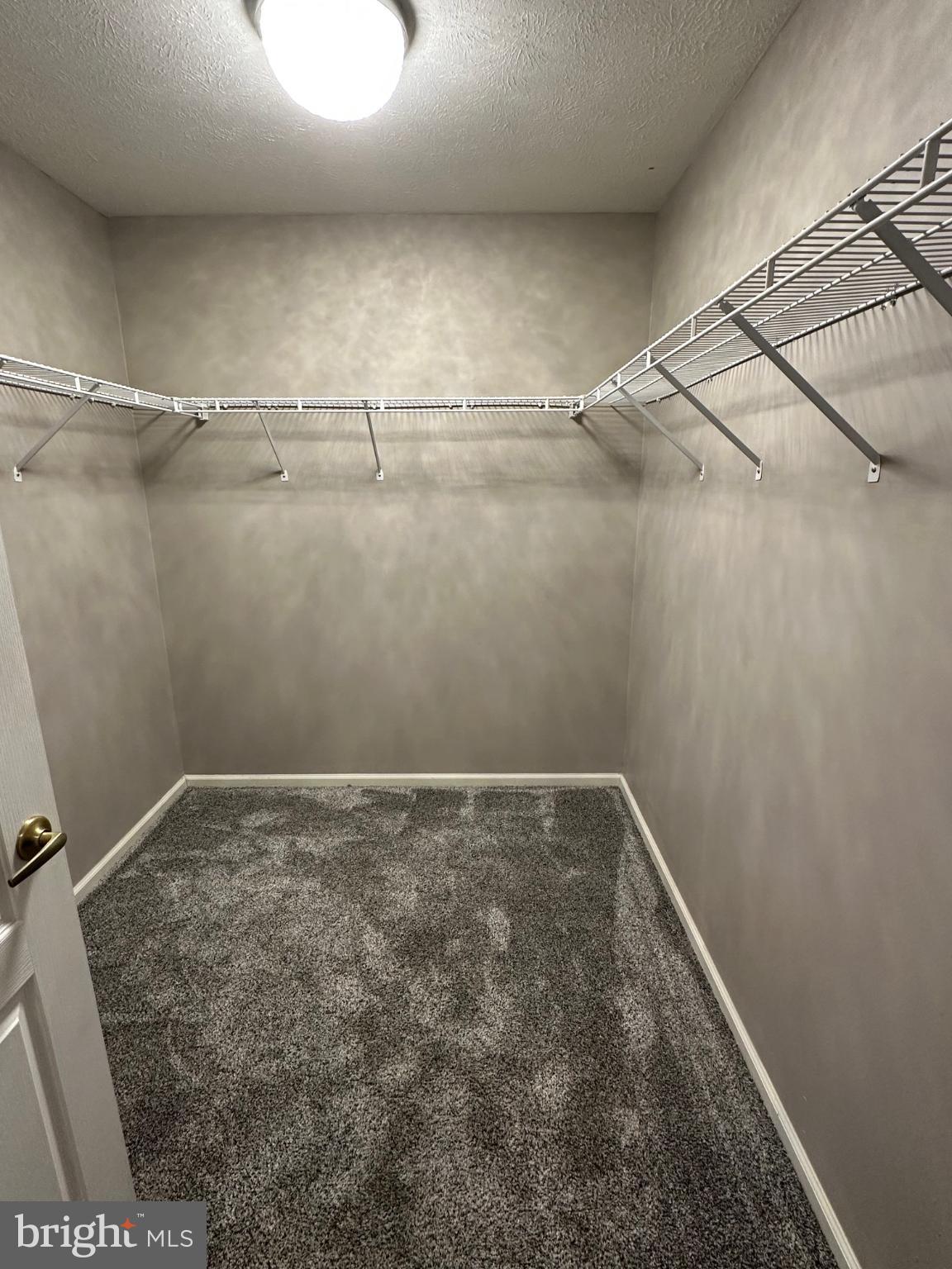 48 Maple Leaf Circle Sewell, NJ 08080 - Photo 15 of 23 a view of a room with racks on the wall