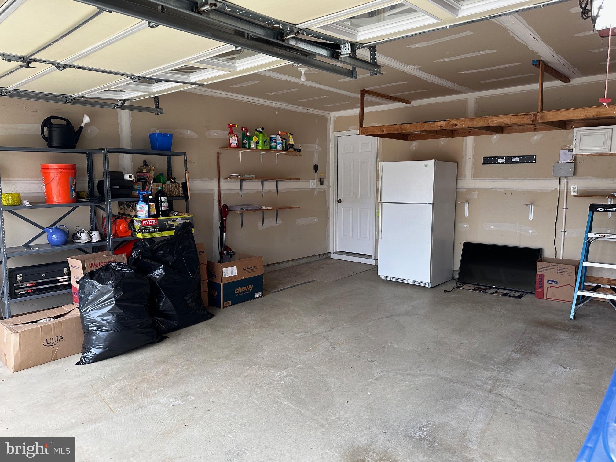 48 Maple Leaf Circle Sewell, NJ 08080 - Photo 23 of 23 a view of a storage room with a fridge
