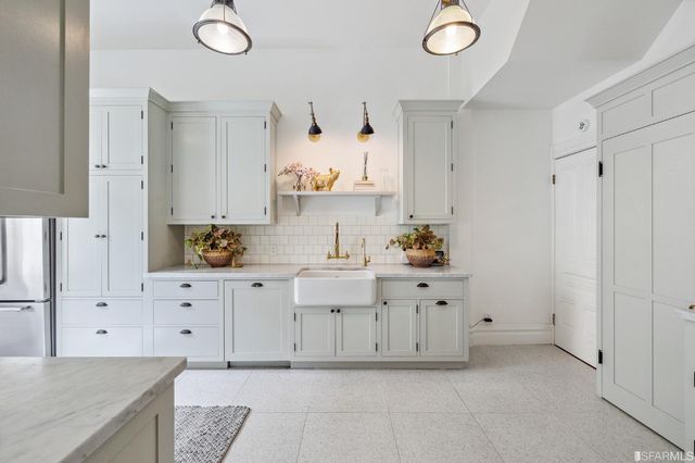 a view of a room with wooden floor and closet