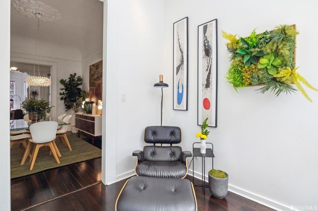 a bed room with a bed and a chair