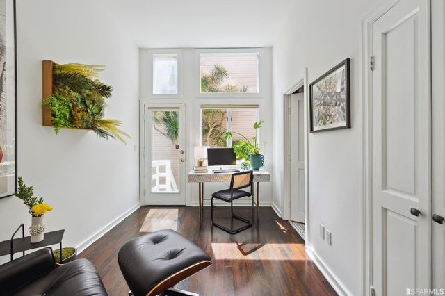a bedroom with a bed and a fireplace
