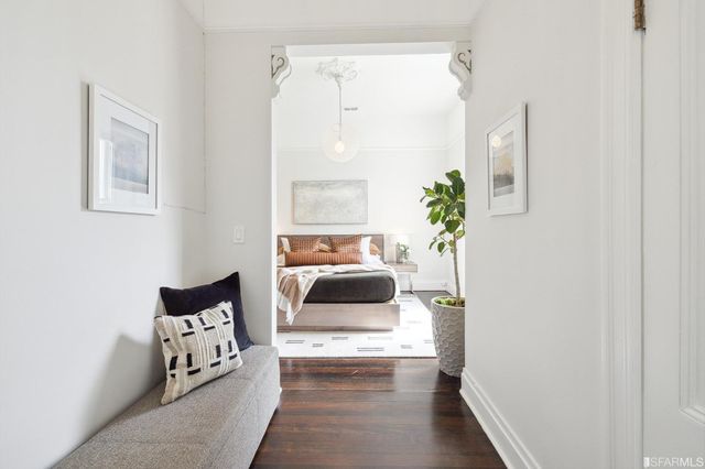 a bathroom with a toilet sink and shower