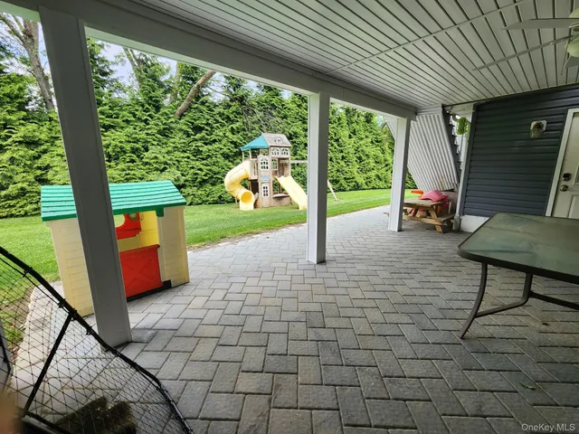a view of a living room and entryway