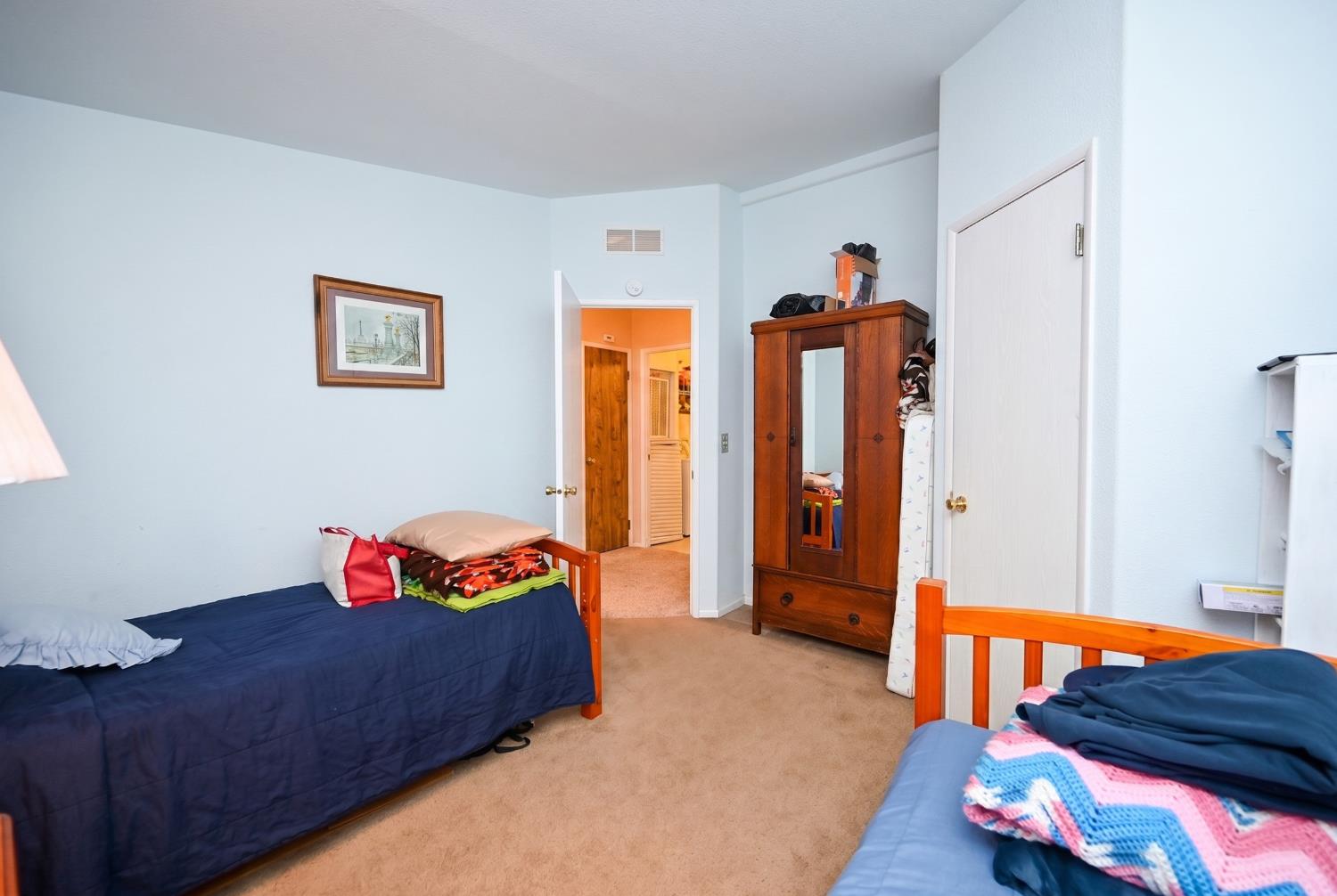 4360 Pleasant Valley Road Placerville, CA 95667 - Photo 58 of 71 a bedroom with bed and closet