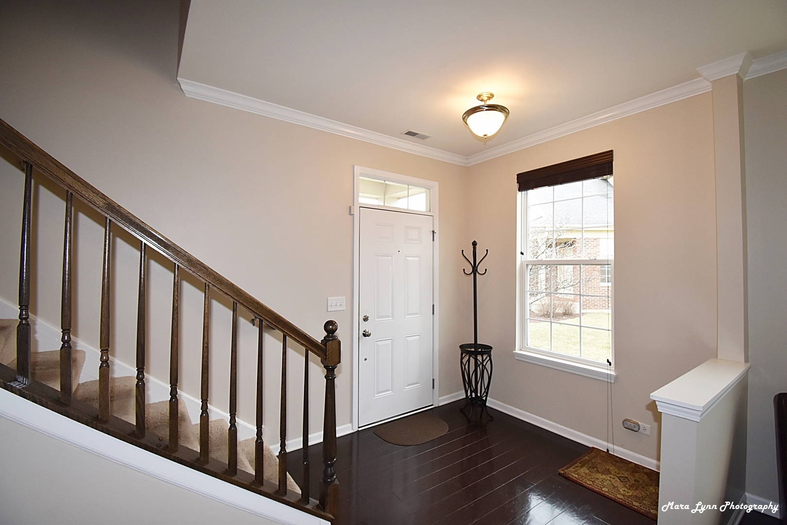 2872 Church Road Aurora, IL 60502 - Photo 11 of 38 a view of entryway with wooden floor and stairs