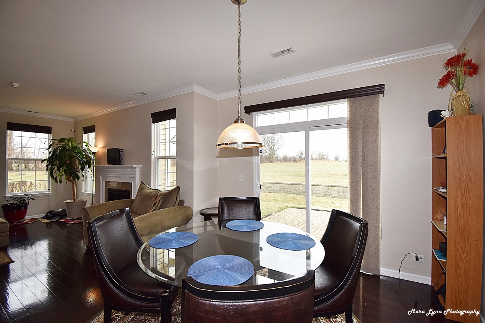 2872 Church Road Aurora, IL 60502 - Photo 19 of 38 a dining room with furniture window wooden floor