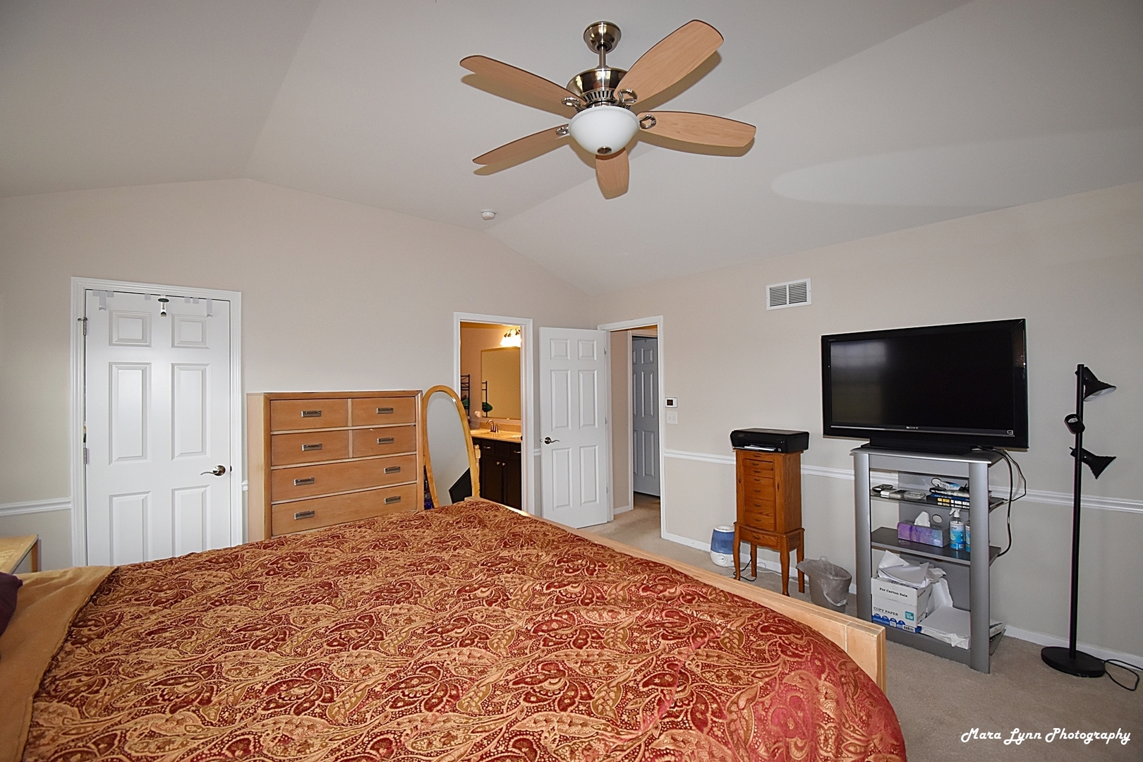 2872 Church Road Aurora, IL 60502 - Photo 28 of 38 a bedroom with a bed and a flat screen tv