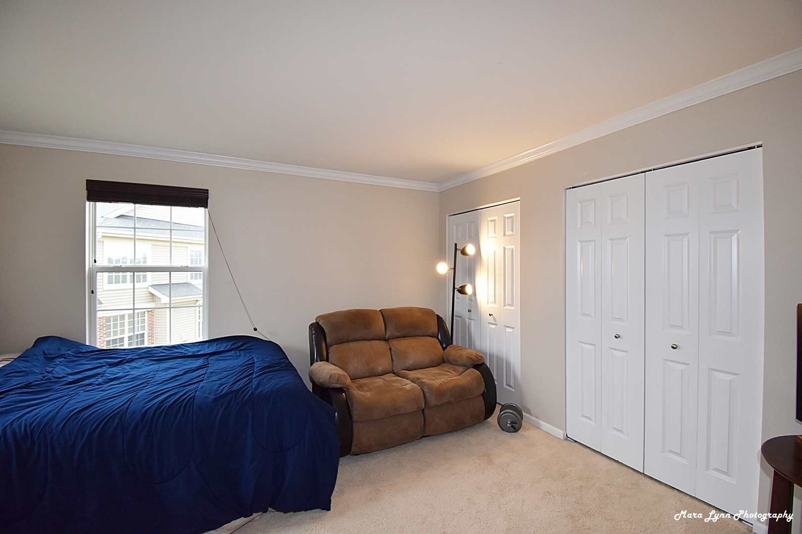 2872 Church Road Aurora, IL 60502 - Photo 32 of 38 a spacious bedroom with a bed and a window