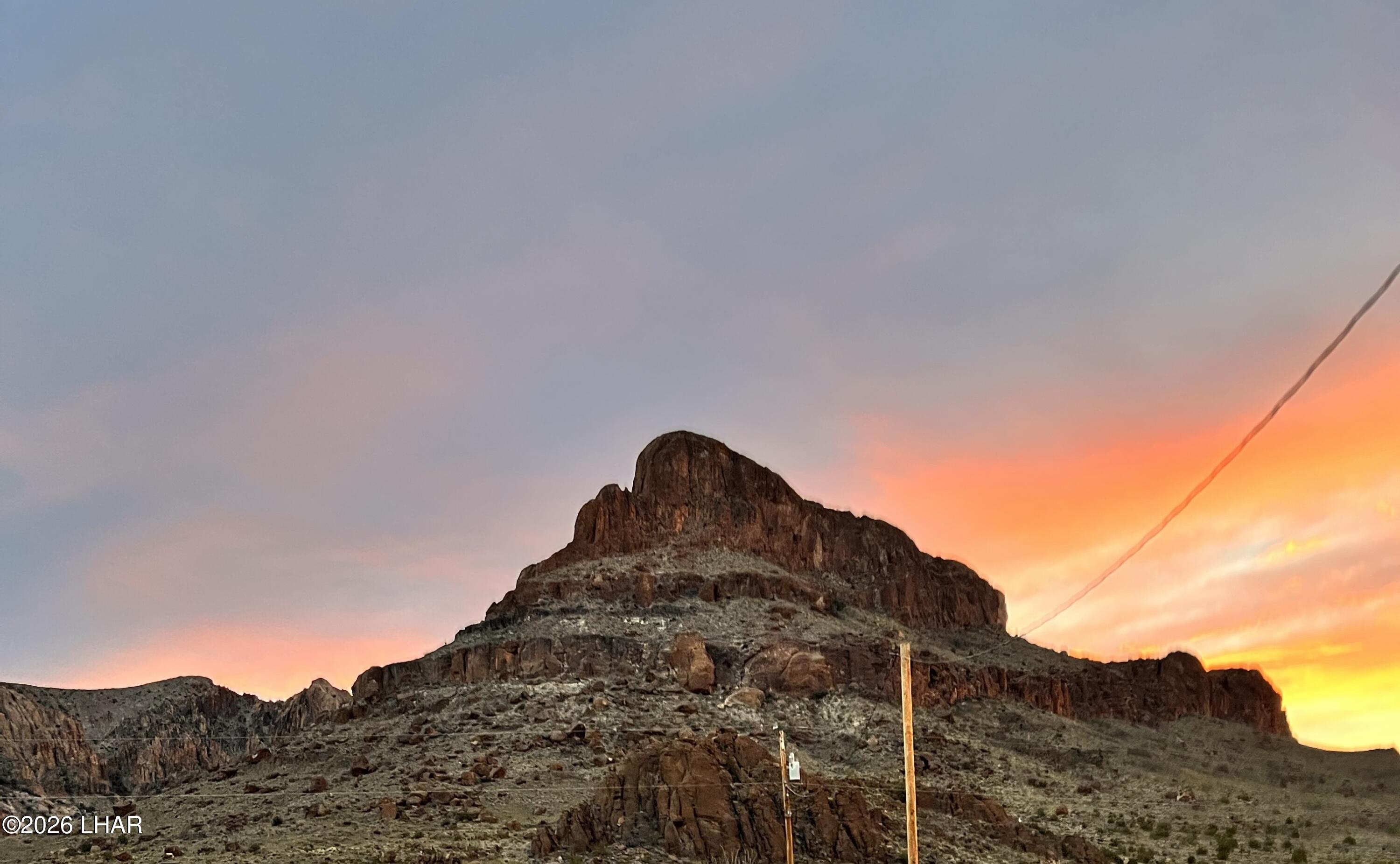 2310 Dewey Road Golden Valley, AZ 86413 - Photo 6 of 71 Sunset views from your new front porch