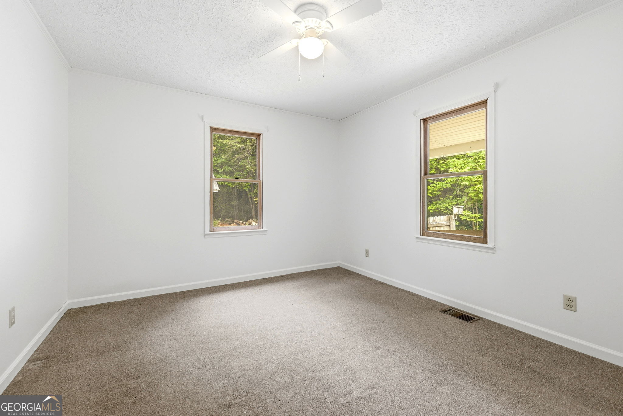 210 Kentucky Street Demorest, GA 30535 - Photo 24 of 30 an empty room with a window