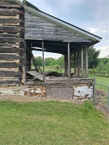 an aerial view of a backyard of a house