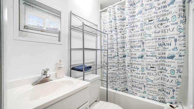 359 East 8400th Street South Sandy, UT 84070 - Photo 19 of 35 Full bathroom featuring vanity and shower / bathtub combination with curtain