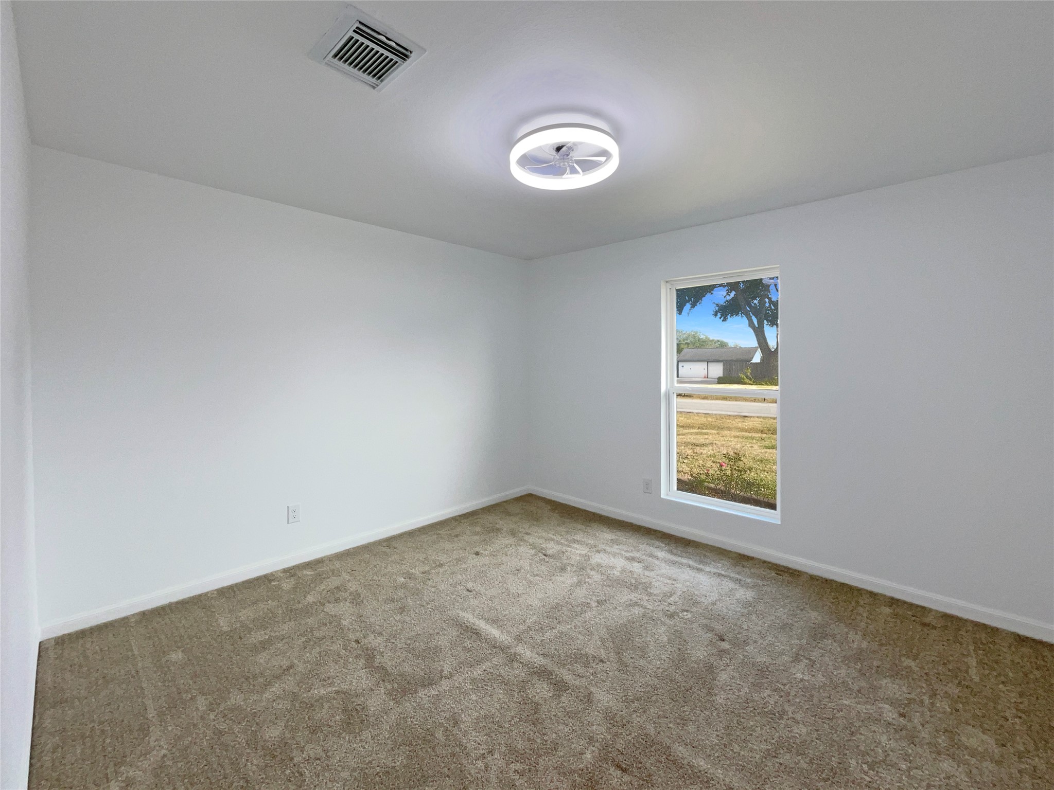 3302 Windsor Drive Pearland, TX 77581 - Photo 15 of 21 an empty room with a window