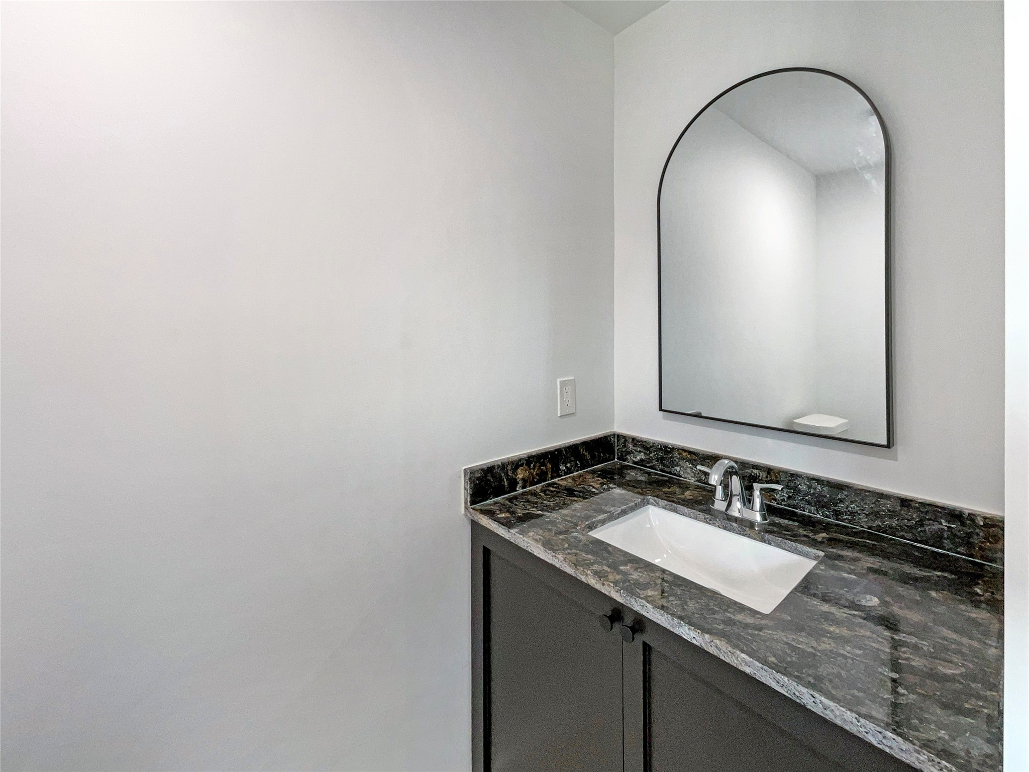 3302 Windsor Drive Pearland, TX 77581 - Photo 20 of 21 a bathroom with a granite countertop sink and a mirror