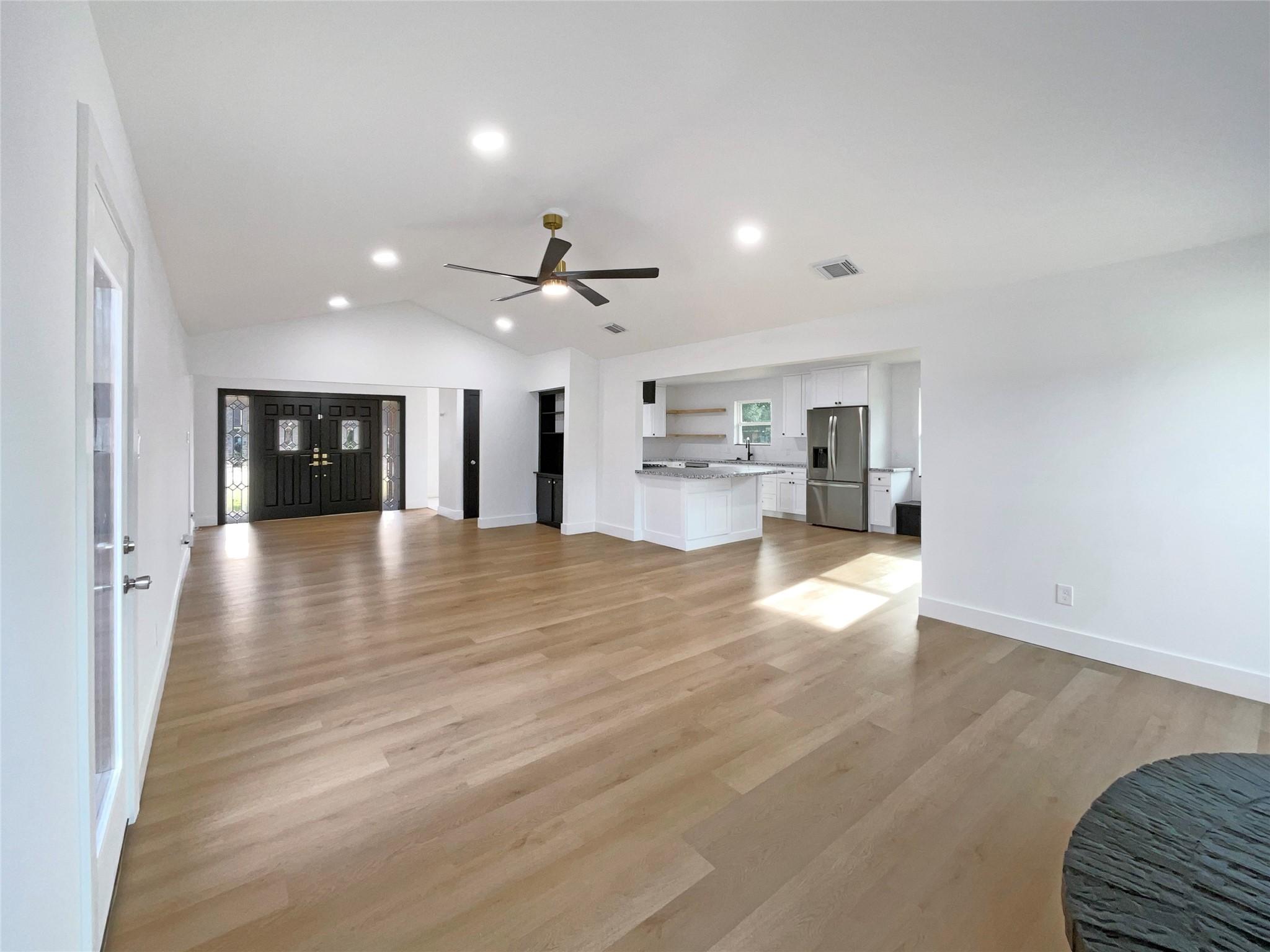 3302 Windsor Drive Pearland, TX 77581 - Photo 10 of 21 a view of a kitchen with a sink and a refrigerator