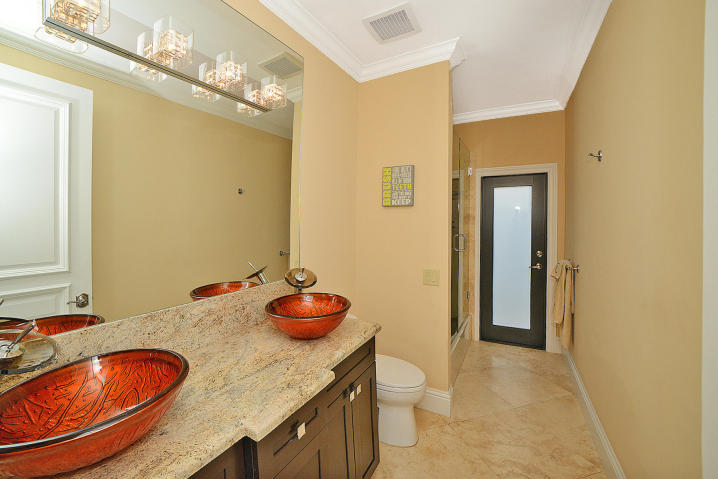 5686 St Annes Way Boca Raton, FL 33496 - Photo 15 of 18 a bathroom with a granite countertop sink and a mirror