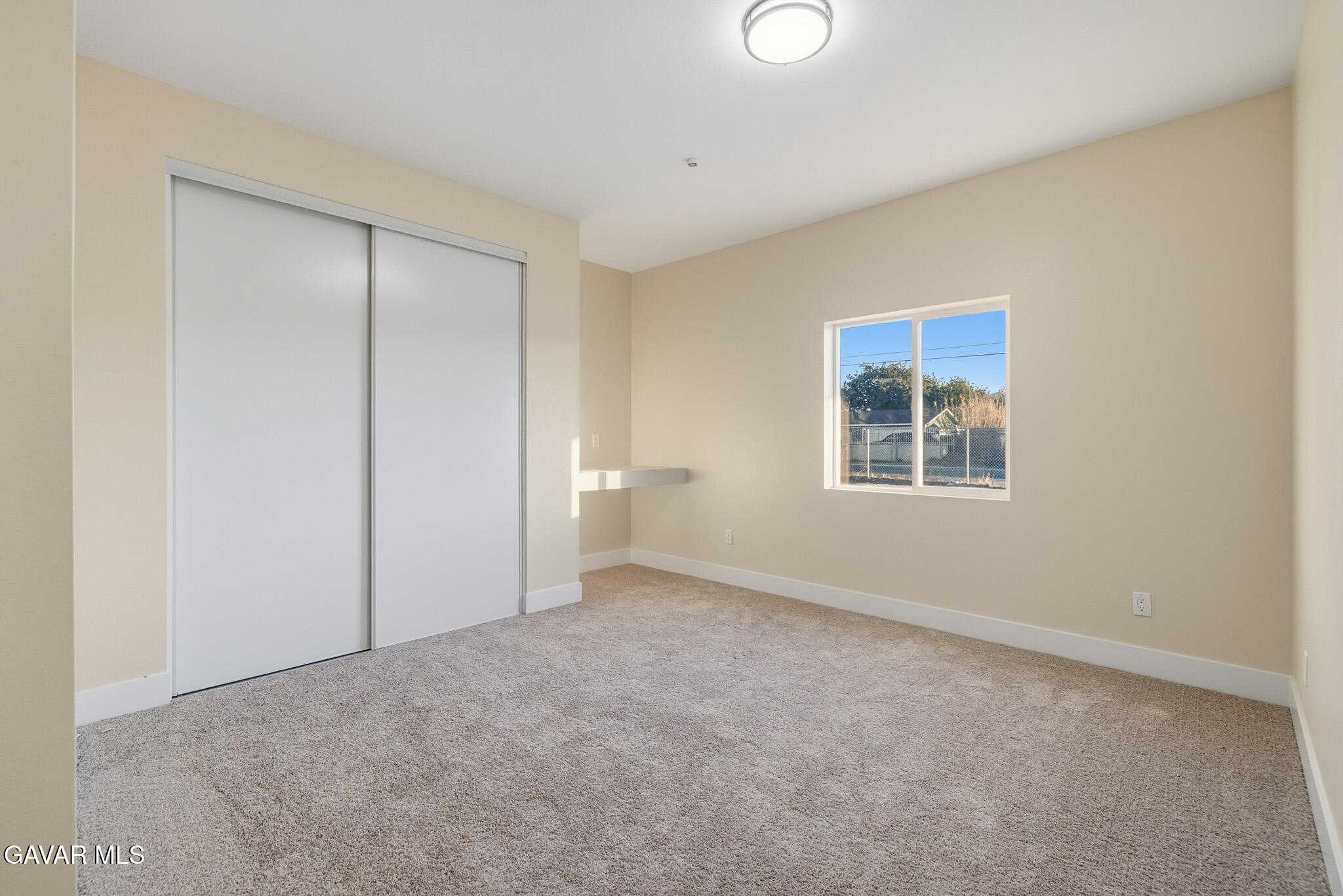 10347 East Ave R 12 Littlerock, CA 93543 - Photo 20 of 32 a view of an empty room with a window
