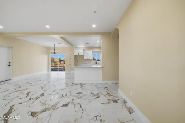 a view of a kitchen with a sink
