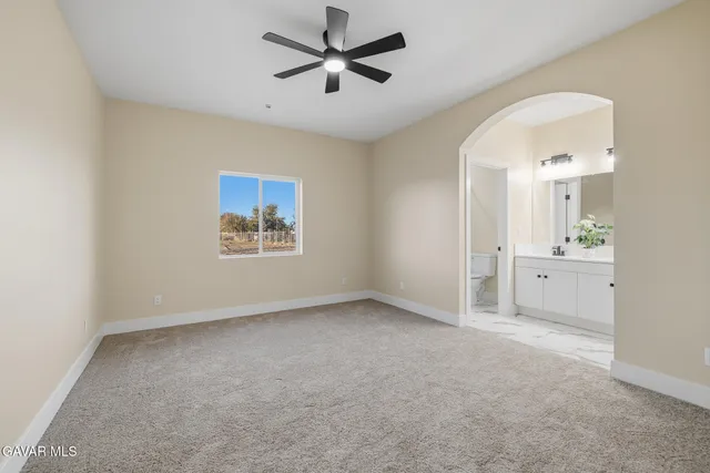 a view of a big room with windows and cabinet