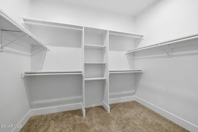 a view of an empty walk in closet