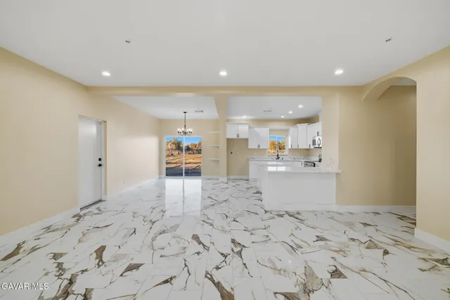 a view of a kitchen and a window