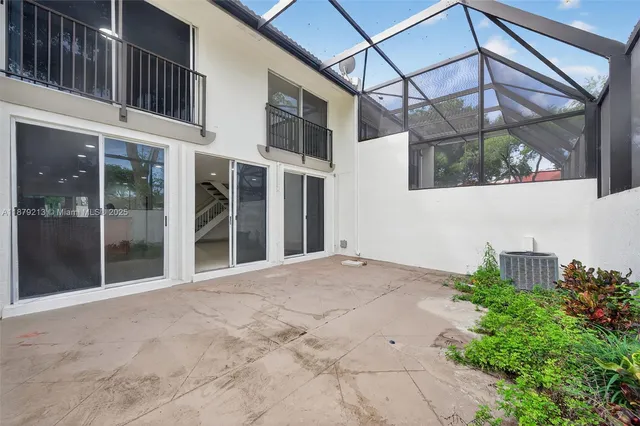 a view of a building with a tree