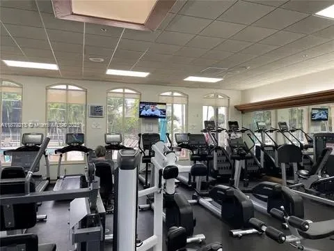 a room with lots of gym equipment