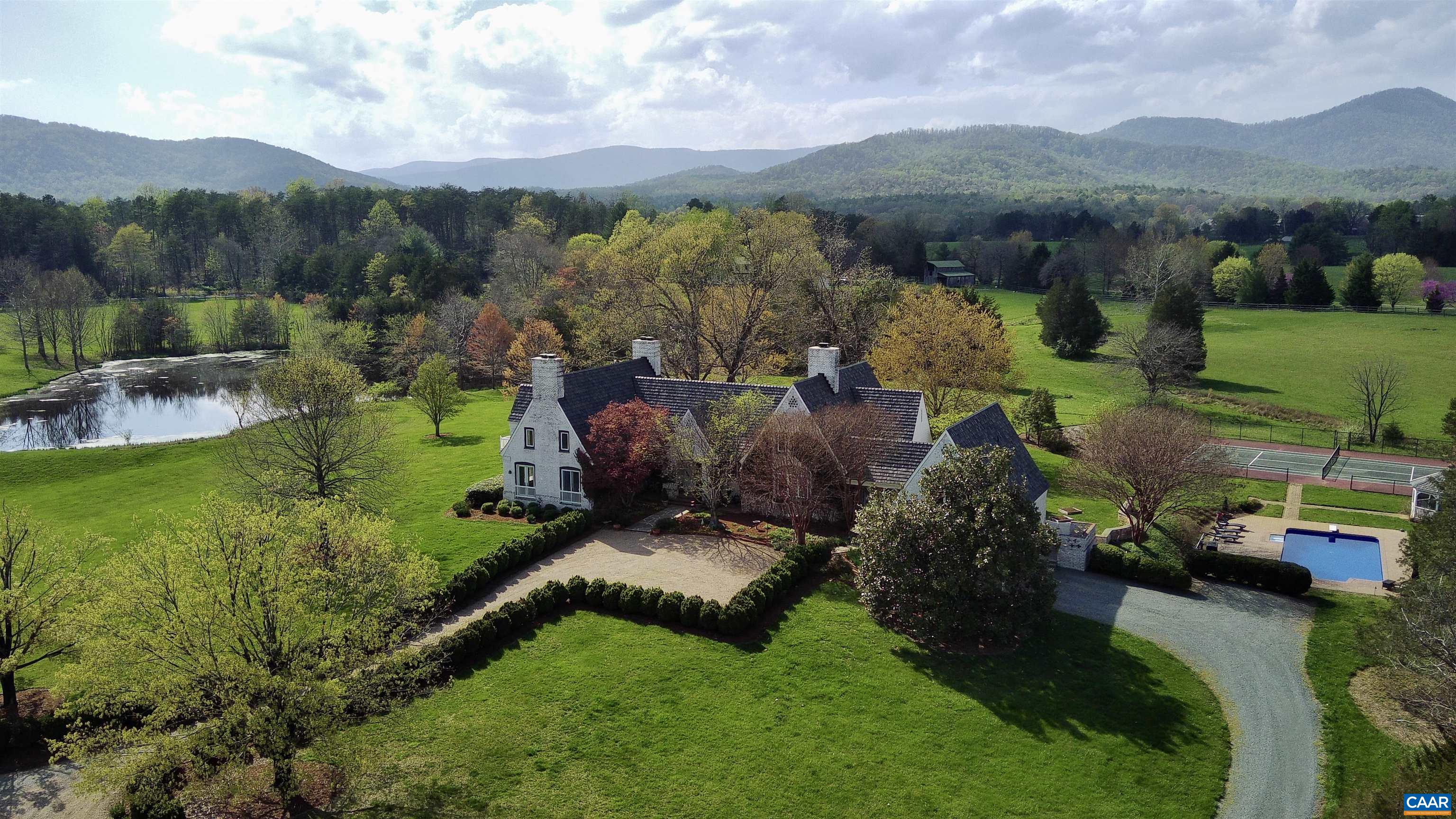 4749 Wesley Chapel Road Free Union, VA 22940 - Photo 1 of 73 a view of a garden with mountains in the background
