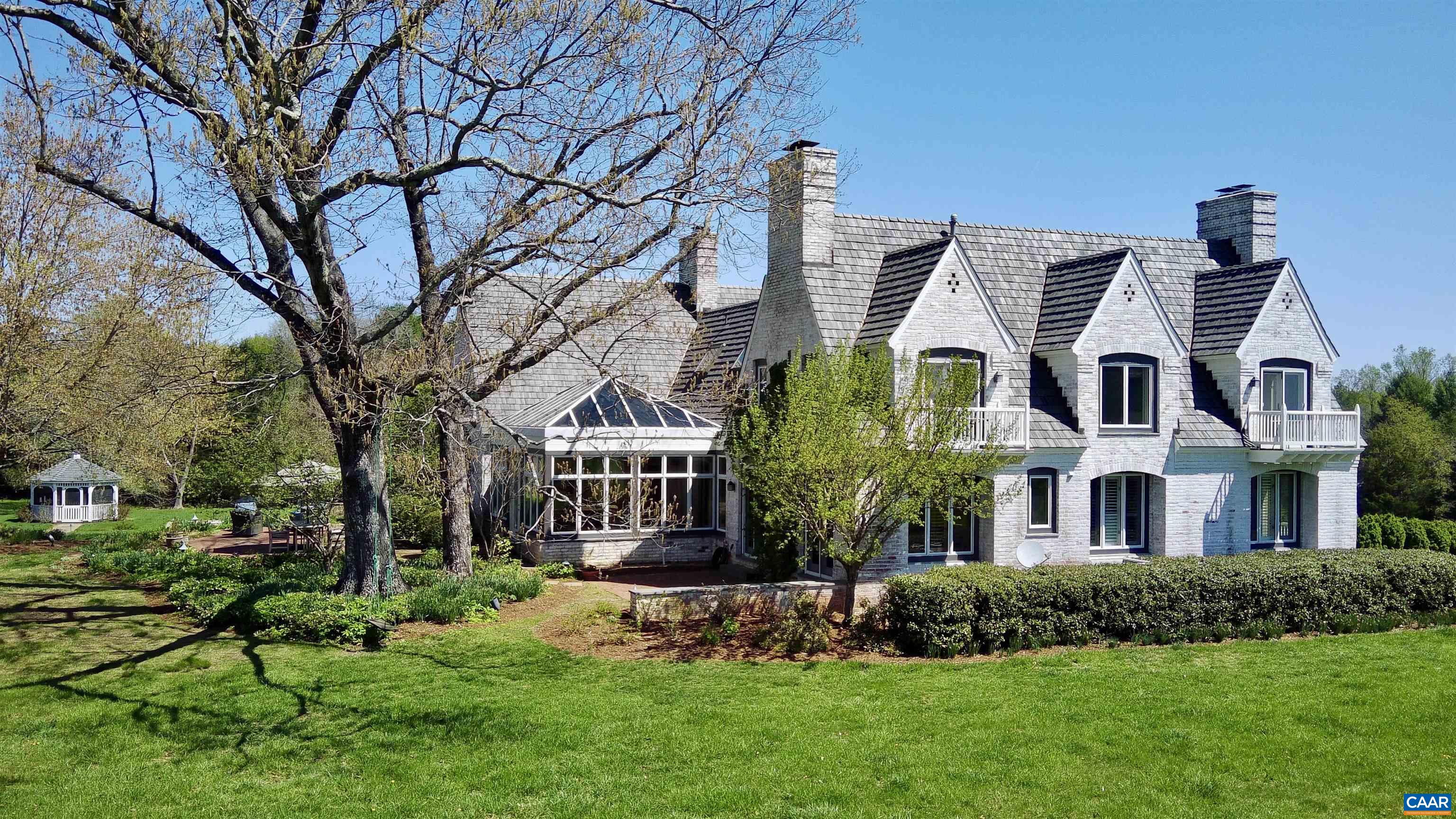 4749 Wesley Chapel Road Free Union, VA 22940 - Photo 11 of 73 a front view of a residential houses with yard and green space