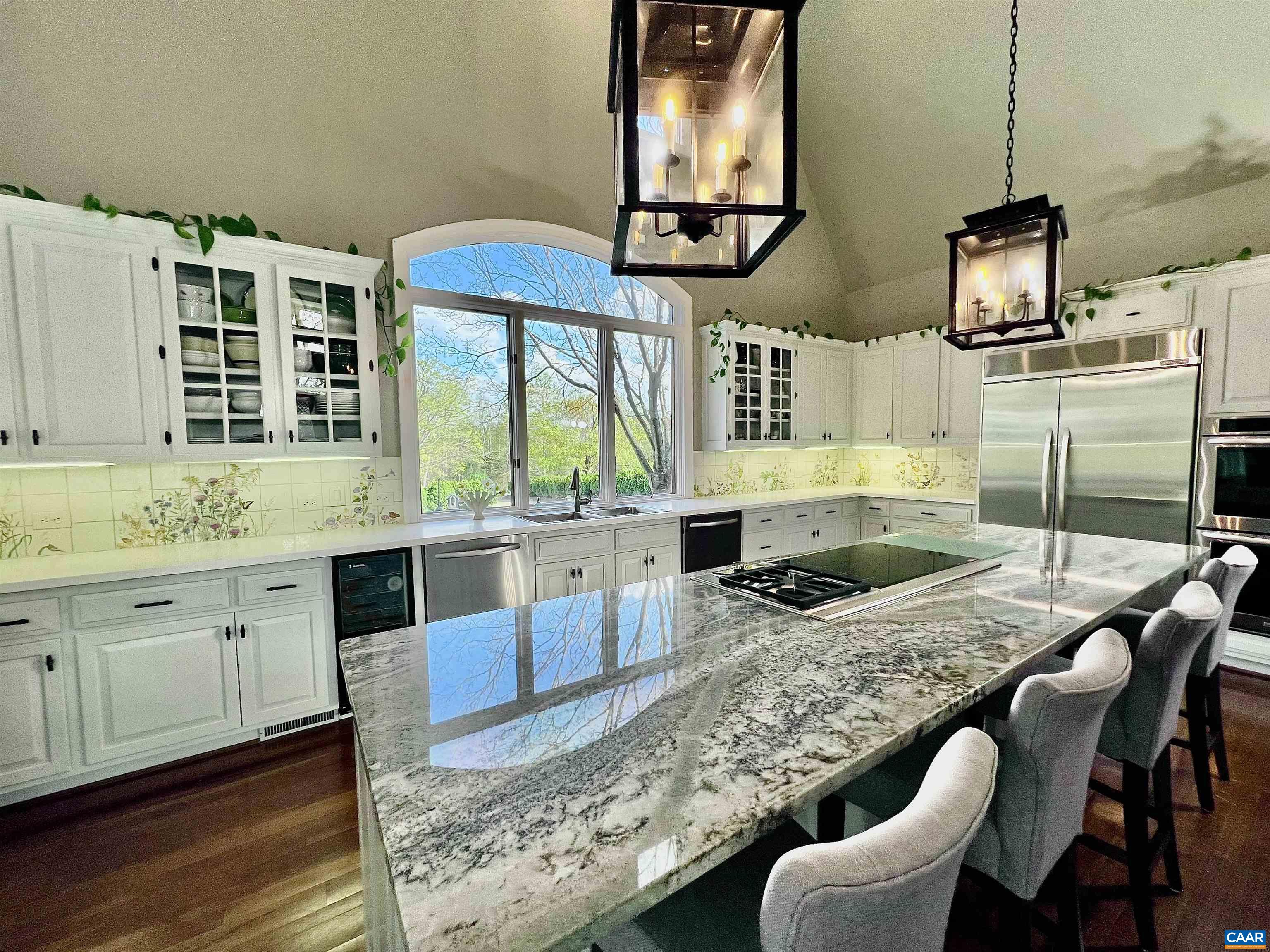 4749 Wesley Chapel Road Free Union, VA 22940 - Photo 19 of 73 a kitchen with stainless steel appliances granite countertop a stove a sink and a refrigerator