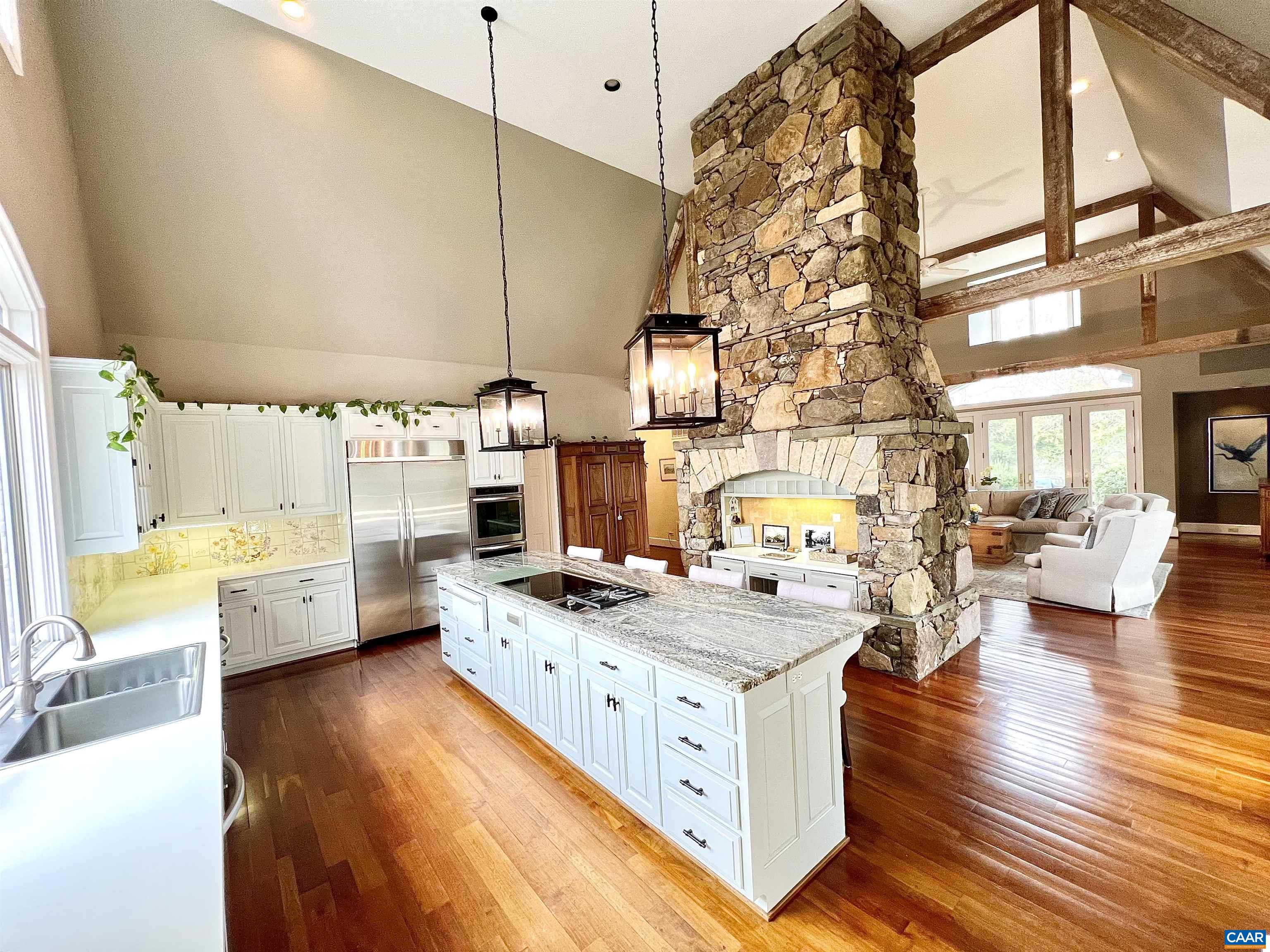 4749 Wesley Chapel Road Free Union, VA 22940 - Photo 20 of 73 a kitchen that has a lot of cabinets a sink and a stove in it
