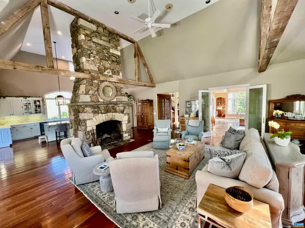 a lobby with furniture and floor to ceiling window