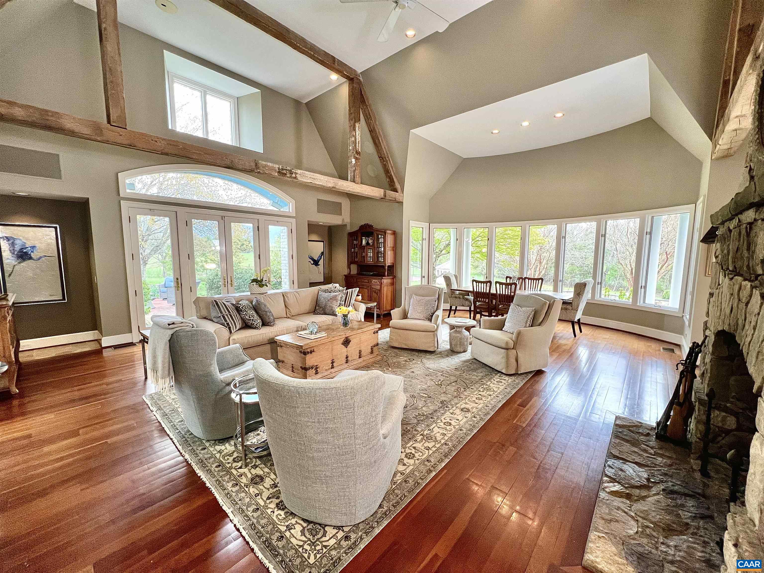 4749 Wesley Chapel Road Free Union, VA 22940 - Photo 24 of 73 a living room with furniture a large window and wooden floor