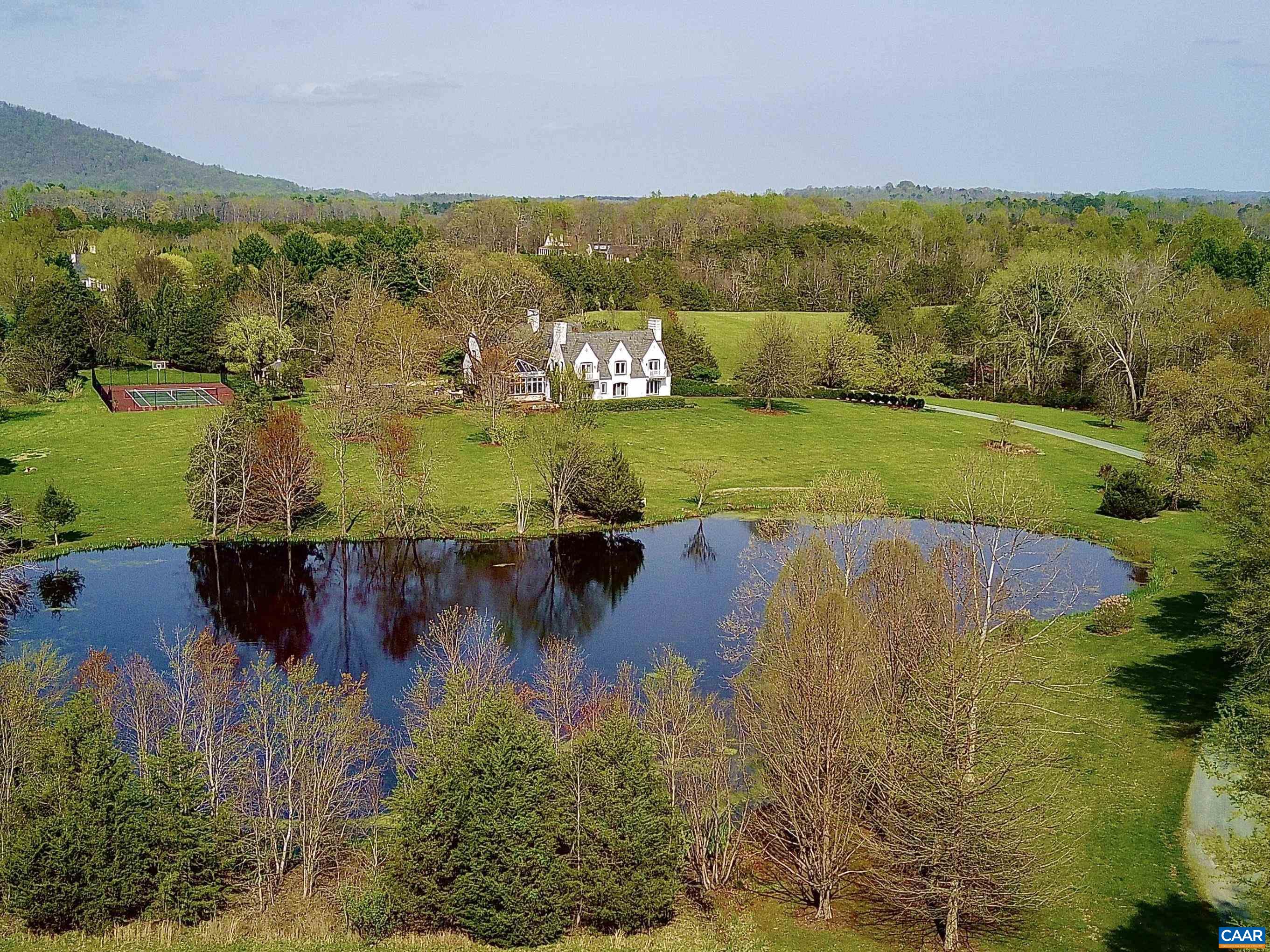 4749 Wesley Chapel Road Free Union, VA 22940 - Photo 3 of 73 a view of a lake with houses