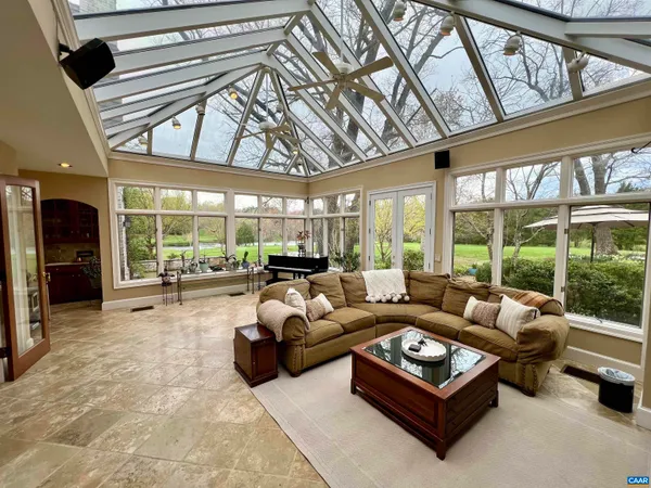 a bedroom with a bed and a fireplace