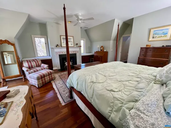 a view of a big yard with large trees